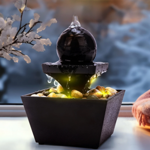 Adorno fuente de mesa con bola y LED